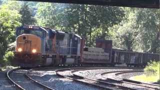 preview picture of video 'Pair Of  EMD's Pull Nice Mixed Freight Train Thru St Denis'