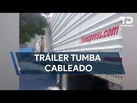 Tráiler tumba cableado en la colonia Terminal en Monterrey