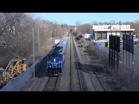 MBTA Commuter Rail train #2409, led by GP40MC #1136, passes under Alewife Brook Parkway in Cambridge