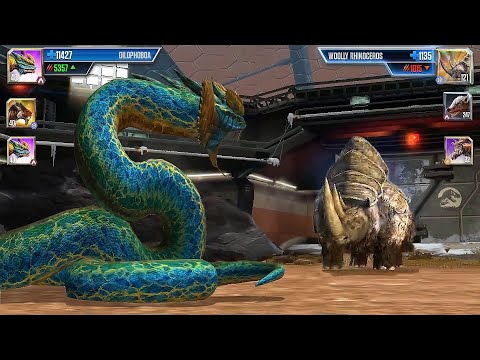 THE GIANT HYBRID SNAKE KING DILOPHOBOA VS WOOLLY RINO | CENOZOIC BATTLE | JURASSIC WORLD THE GAME