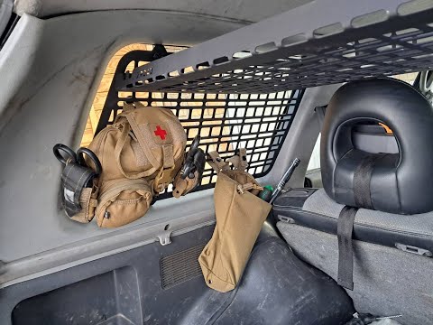 Molle-панель Xroad XRM-MPS1-RWR для Mitsubishi Pajero Sport G1/L200/Montero/Nativa на окно в багажник/правая - фото 1 - id-p2374931675