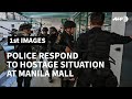 Police respond to reported mass hostage-taking at Manila mall | AFP
