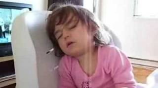 my little girl sleeping in her chair just fell asleep so funny (french)