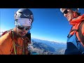 Two Instagrammer balancing at the knife edge ridge. SCARY SUMMIT TRAVERSE - Matterhorn summit ridge