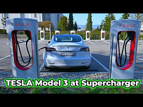 Charging TESLA Model 3 at Supercharger in Europe 2020