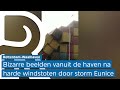 Opgestapelde containers vallen om na harde wind van storm Eunice