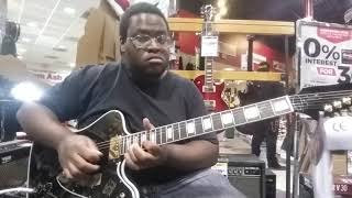 Video thumbnail for Playing a Gibson Firebird Custom Ebony at Sam Ash Musical Instruments in Richmond, Virginia by Christian Phifer