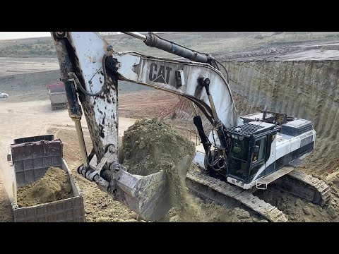 Caterpillar 375 Excavator Loading Mercedes And MAN Trucks