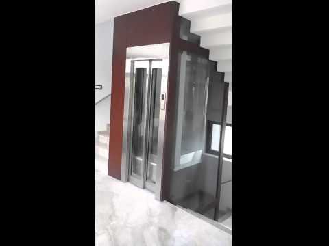 Hydraulic glass home elevator