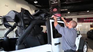 How To Fold Down/Raise Soft Top Off Jeep Wrangler | Jake Sweeney Chrysler Jeep Dodge Ram
