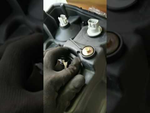 09 Mitsubishi galant head light removal and replace...part 1