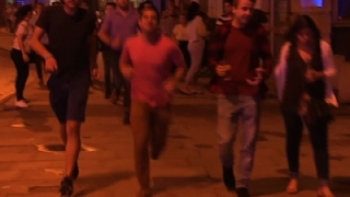 Raw: Man Flees London Attack While Holding Beer