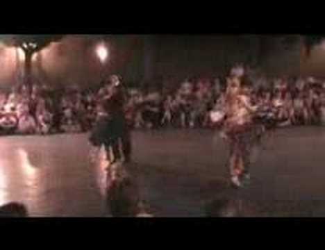  Alejandra Hobert,    Adrian Veredice,    Eugenia Parilla,    and  Ezequiel Farfaro  are  dancing  to  a  tango