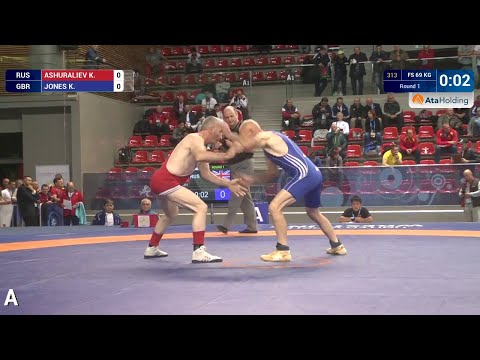 Round 1 FS - 69 kg: K. ASHURALIEV (RUS) df. K. JONES (GBR) by TF, 11-0