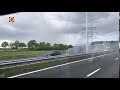 Flinke file op de A58 bij knooppunt De Baars door in brand gevlogen busje