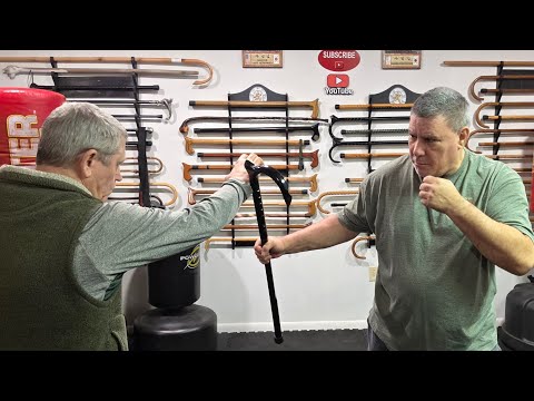 Cane Self Defense with doing a circular block using a palm rest cane.