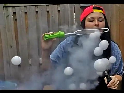 Girl Makes Smoke filled Bubbles