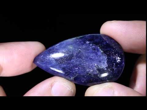 Iolite Sunstone cabochon.  50.77cts.