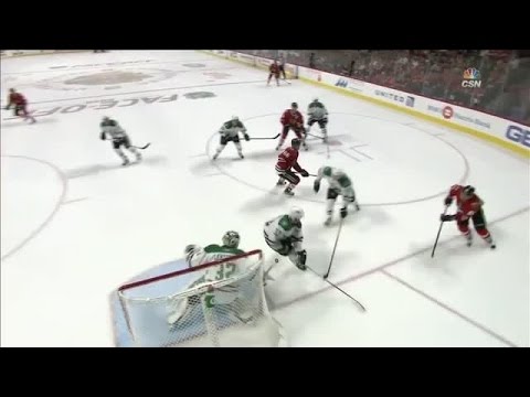Hossa banks puck in off Lehtonen’s back