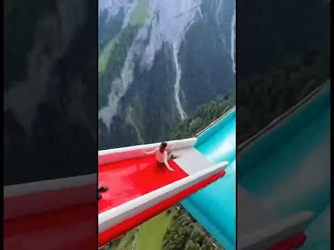 Cliff Slide is Insane! 😱🔥 Girl Slides with Instructor on Cliff Airbag! #cliffactivity #cliffslide