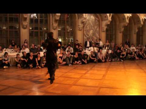 Adrian Veredice  and  Alejandra Hobert  are  dancing  to  the  tango  "  Contame una Historia  "  by  Osvaldo Pugliese  in  2011