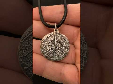 Delft clay casting silver leaf pendant.