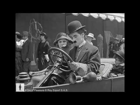Charlie Chaplin trapped in tar - A Day's Pleasure (1919)