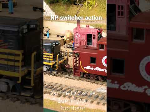 , title : 'BN era NP switcher rescues an NP caboose from BN F units'