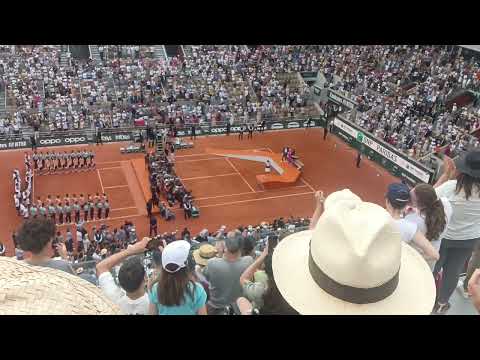 Roland-Garros winner Iga Swiatek knocked part of the cup down while lifting it