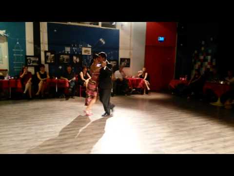  Johana Copes  and  Joaquin Besga  are  dancing  to  "  A La Gran Muñeca  "  by  Carlos di Sarli