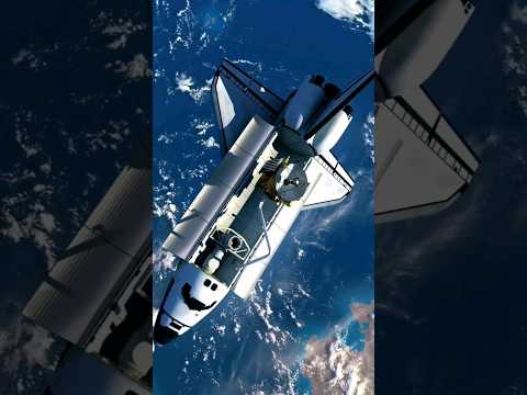 space shuttle deploying satellite