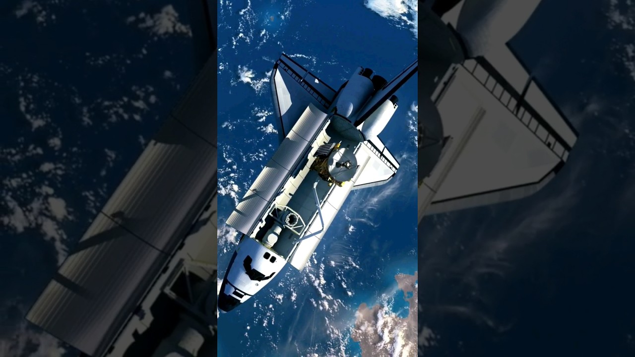 space shuttle deploying satellite