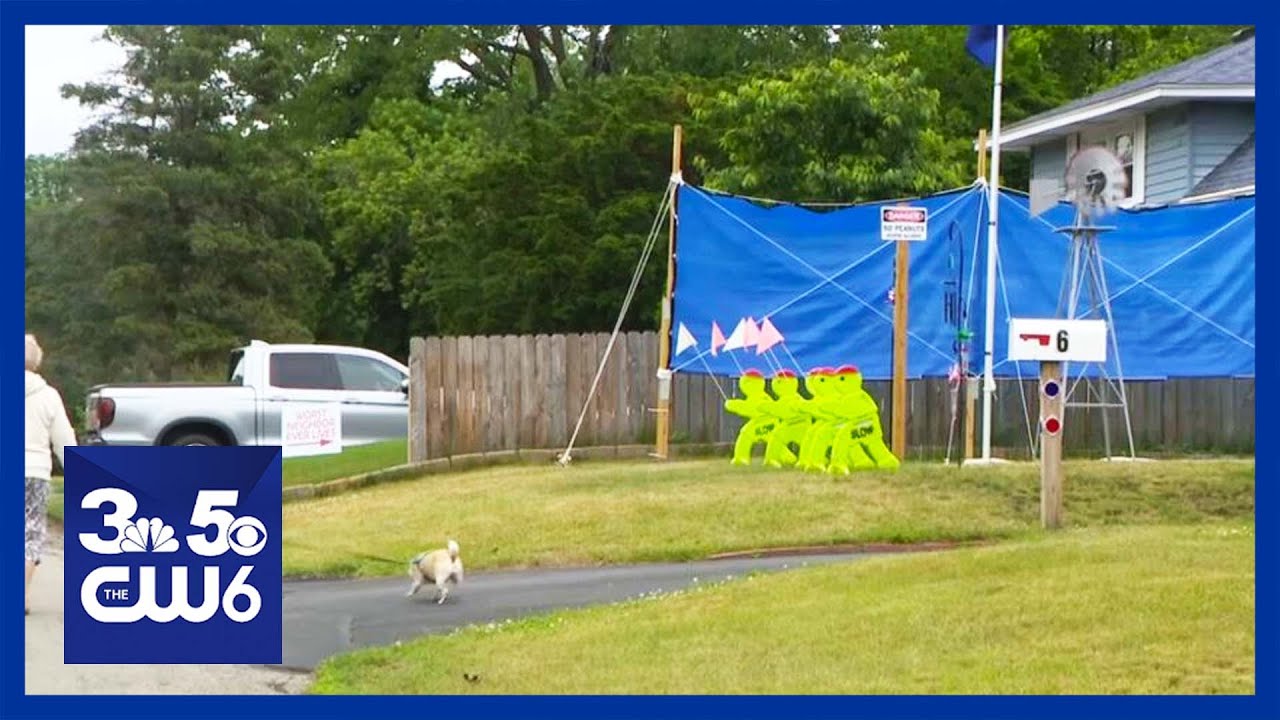 Worst Neighbor Ever? Neighbor feud escalates to man-made wall