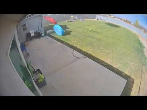 Strong Winds Blow Trampoline and Kiddie Pool Away - 1328460