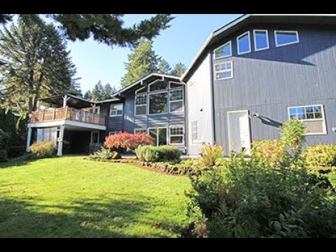 3879 Sq. Ft. of Amazing Features in this Remodeled West Slope 3 Bedroom Mid-Century Home! property video