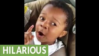 Adorable little boy preciously sings a song