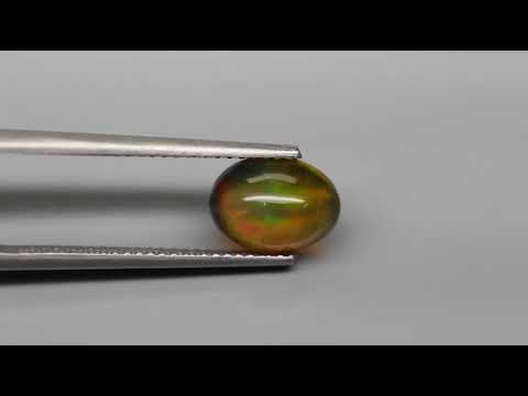 Natuurlijk Opaal Cabochon Kleur Multi Color, oranje groen geel violet blauw knipperend 1,22 ct.