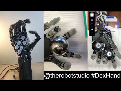 Side-by-side view of the V1.0 and the V2.0 Dexhand (white fingertips)