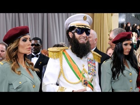 Sacha Baron Cohen Spills Ashes on Ryan Seacrest at Oscars