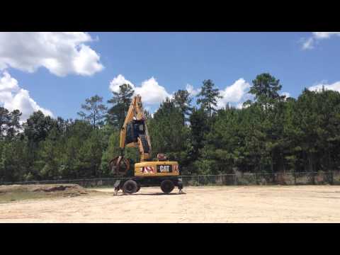 2010 Cat M322D MH with Gen Set and Grapple FOR SALE