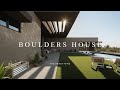 Desert House Design Between Boulders Surrounding It With View Of The Mountains