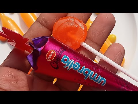 Umbrella chocolate and juicy lollipop candy lozenge / shimu soha ltd