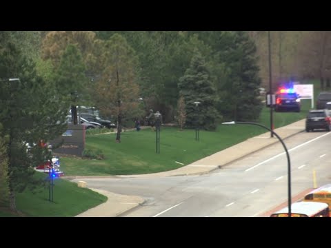Two people are in custody outside Denver, accused of opening fire in a charter school, killing a teenager and wounding eight others. Authorities say the student who was killed was an 18-year-old male. (May 8)