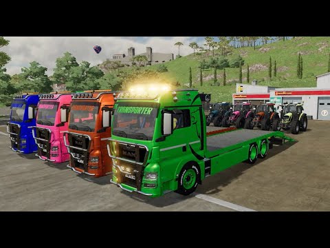 TRANSPORT OF COLORS TRACTORS TRANSPORTED ON BIG RIG AUTO TRUCKS