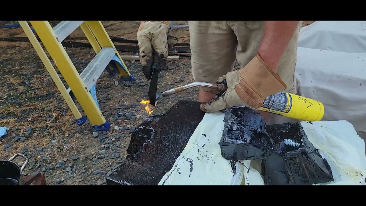 PITCHING THE BILGE -- INTRO. How to seal the pockets in the bilge of a wooden boat with asphalt.