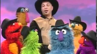 Garth Brooks and The Sesame Street Muppets-We Make Music.mp4