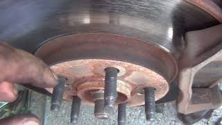 2000-2007 Ford Taurus 2000-2005 Mercury Sable How to change warped rotors and disc pads