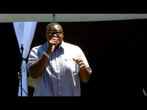 Minister Larry Austin raps at Juneteenth Festival in Oakland, CA