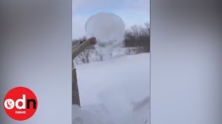 WHAT just happened?! Boiling water turns instantly to snow in freezing Midwest