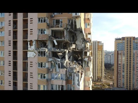 Aerial images of damaged Kyiv building after rocket hit | AFP